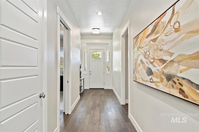 2165 N Luge Ave, Eagle, ID 83616 - doorway to outside with baseboards, dark wood-style floors, and recessed lighting