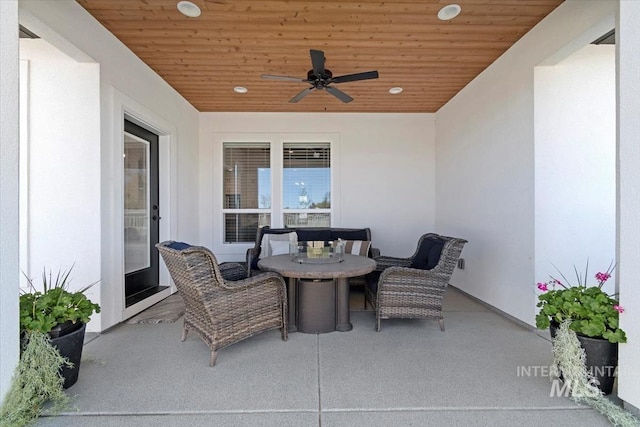 view of patio / terrace featuring a ceiling fan and outdoor dining area