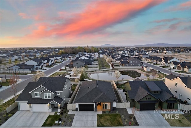 drone / aerial view with a residential view