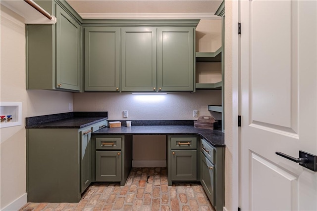 kitchen featuring green cabinetry