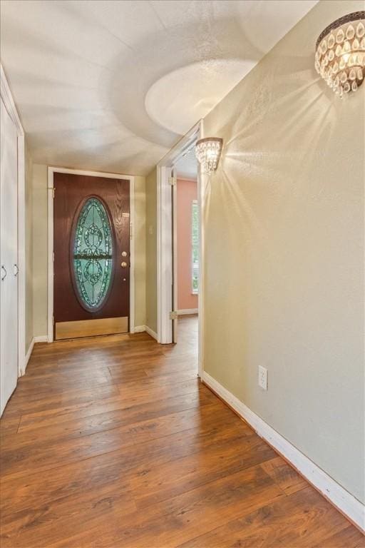 entrance foyer featuring hardwood / wood-style floors