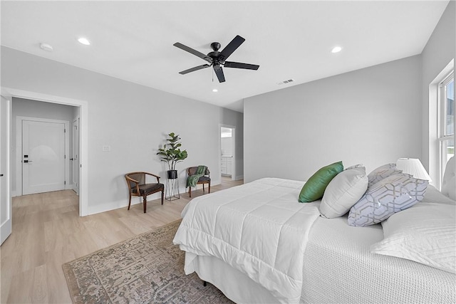 bedroom featuring ceiling fan and light wood-type flooring