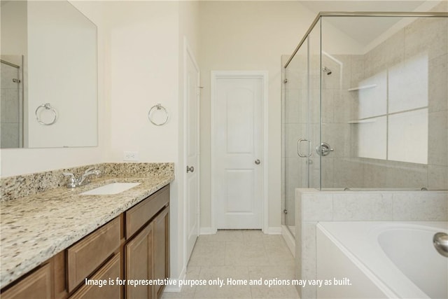 bathroom with plus walk in shower, tile patterned flooring, and vanity