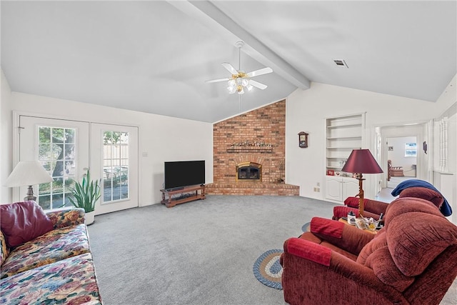 living area featuring carpet, french doors, a fireplace, vaulted ceiling with beams, and visible vents