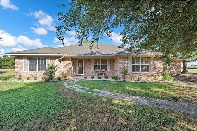 view of front of property with a front lawn