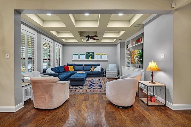 living room featuring beamed ceiling, hardwood / wood-style floors, ceiling fan, and coffered ceiling