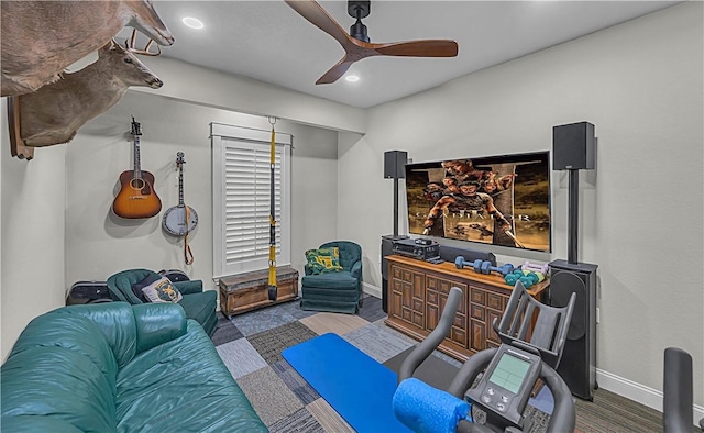 interior space with ceiling fan and carpet floors