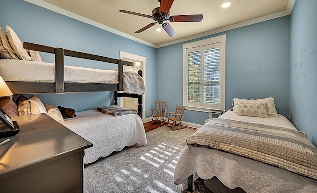 bedroom featuring ceiling fan, light wood-type flooring, and ornamental molding