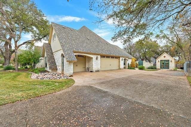 view of property exterior with a yard and a garage