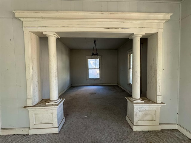 unfurnished living room with dark colored carpet