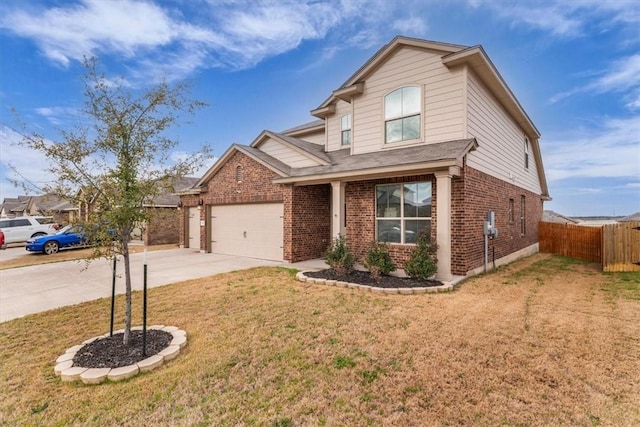 traditional home with brick siding, fence, concrete driveway, a front yard, and an attached garage