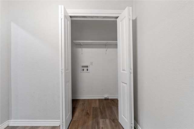 laundry area with dark wood-type flooring and washer hookup