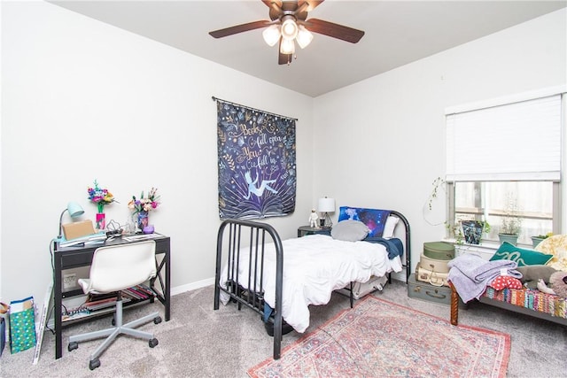 bedroom with ceiling fan and carpet flooring