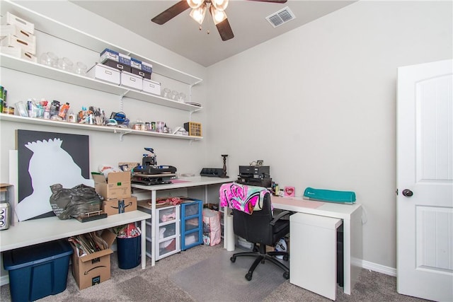 office space featuring ceiling fan and carpet flooring