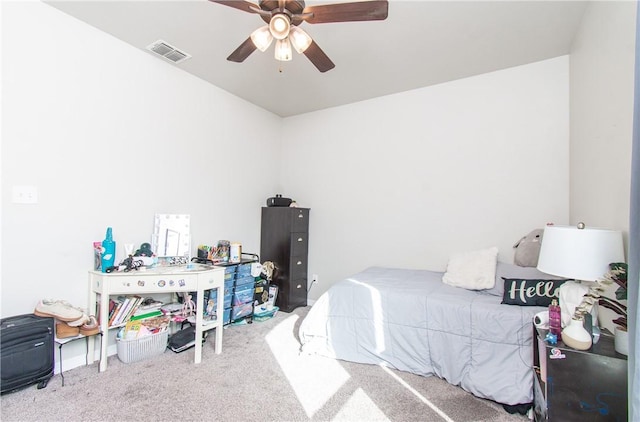 carpeted bedroom with ceiling fan