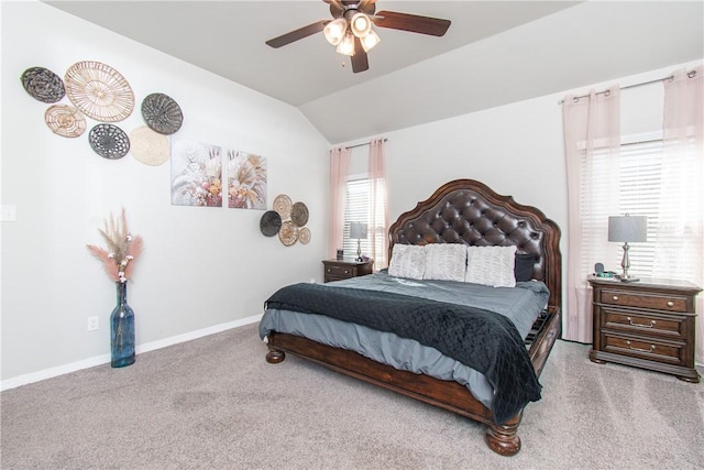 carpeted bedroom featuring ceiling fan and lofted ceiling