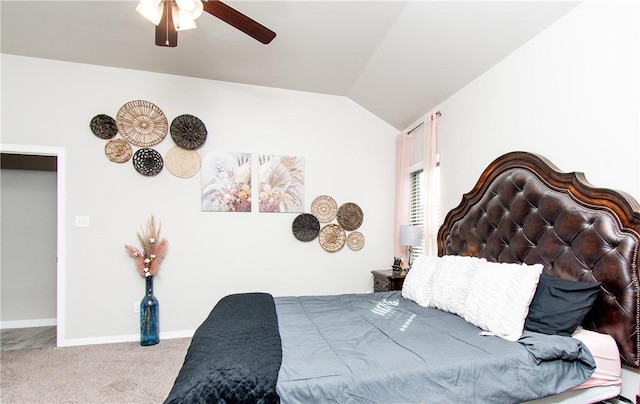 bedroom featuring lofted ceiling, ceiling fan, and carpet