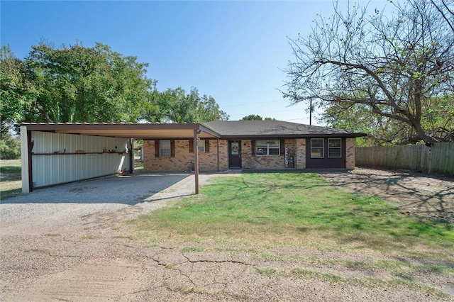 ranch-style home with a carport