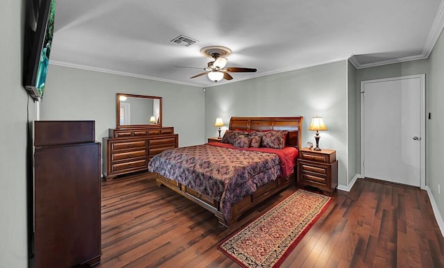 bedroom featuring visible vents, ornamental molding, a ceiling fan, dark wood-style floors, and baseboards