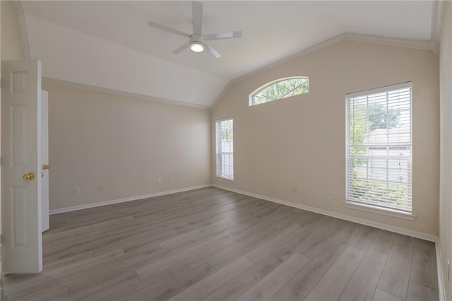 unfurnished room featuring light hardwood / wood-style flooring, ceiling fan, and lofted ceiling