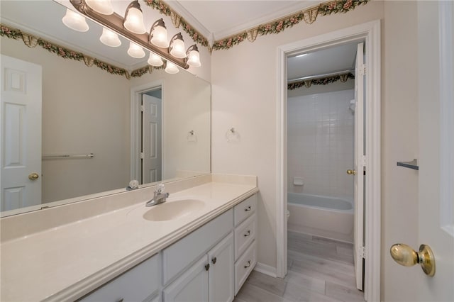 full bathroom with wood-type flooring, vanity, bathing tub / shower combination, and toilet