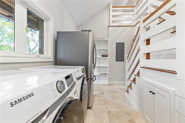 clothes washing area featuring washing machine and dryer and electric panel