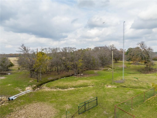 view of yard with a rural view