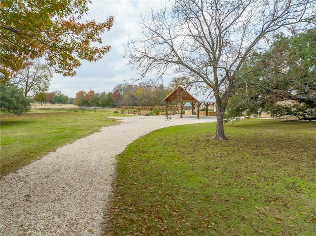 view of property's community featuring a gazebo and a yard