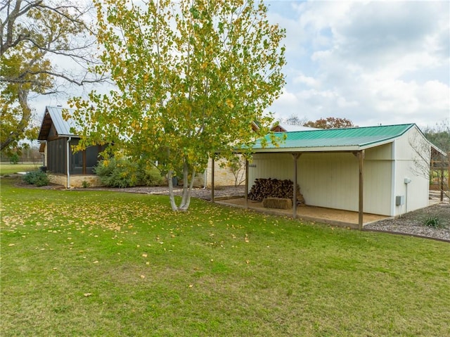 view of yard with a sunroom