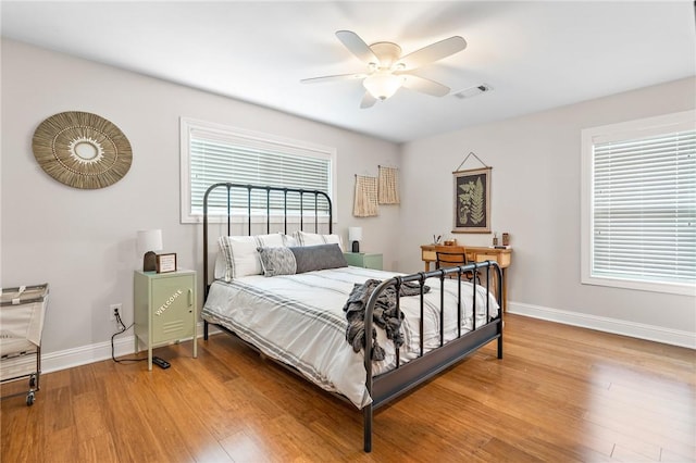 bedroom featuring ceiling fan and hardwood / wood-style floors