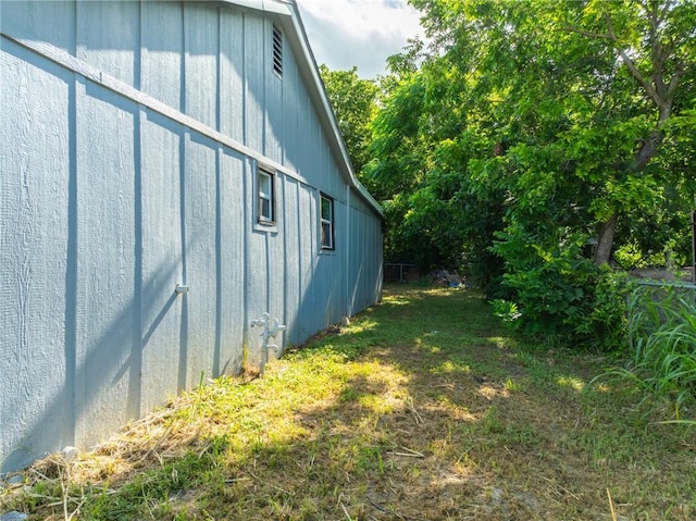 view of property exterior featuring a yard