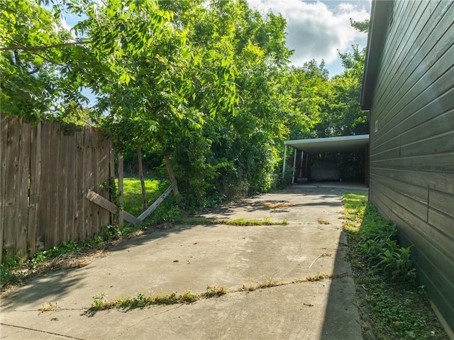 view of yard with a carport