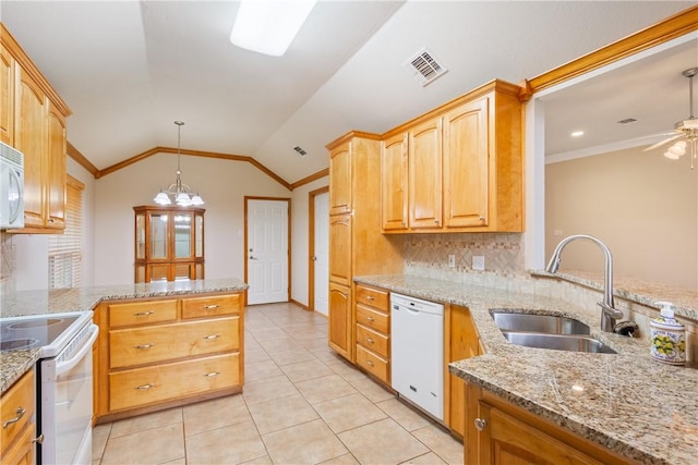 kitchen featuring kitchen peninsula, white appliances, sink, pendant lighting, and lofted ceiling