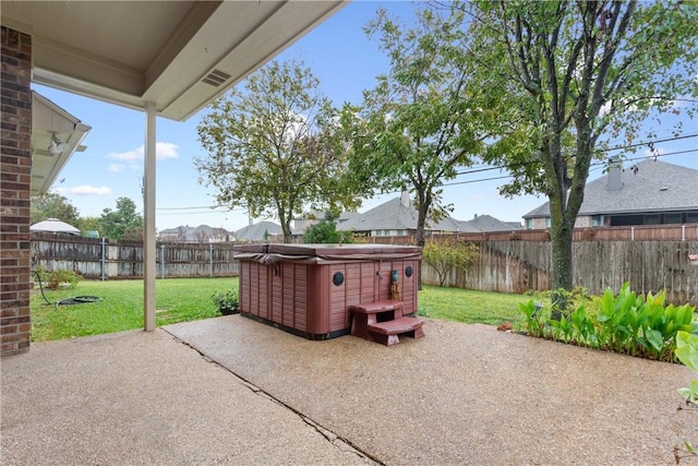 view of patio with a hot tub