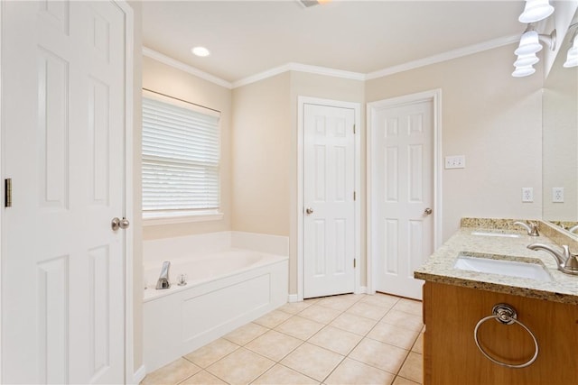 bathroom with tile patterned flooring, vanity, ornamental molding, and a tub