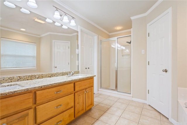 bathroom with tile patterned floors, vanity, ornamental molding, and walk in shower