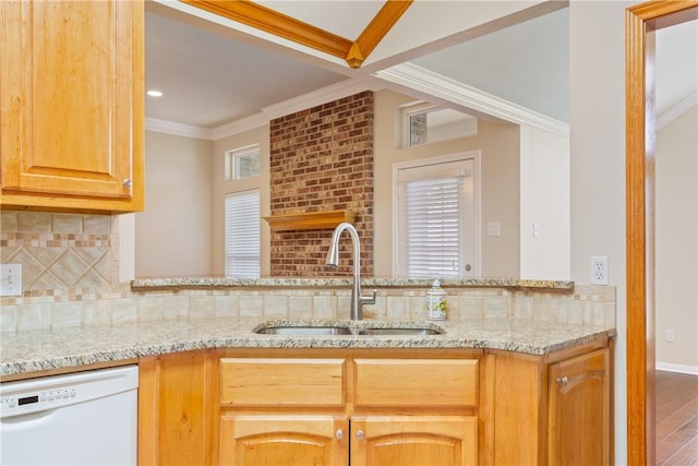 kitchen featuring dishwasher, hardwood / wood-style floors, crown molding, and sink