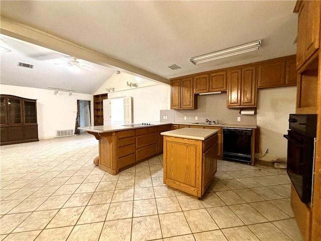 kitchen with a kitchen island, light tile patterned flooring, ceiling fan, and black appliances