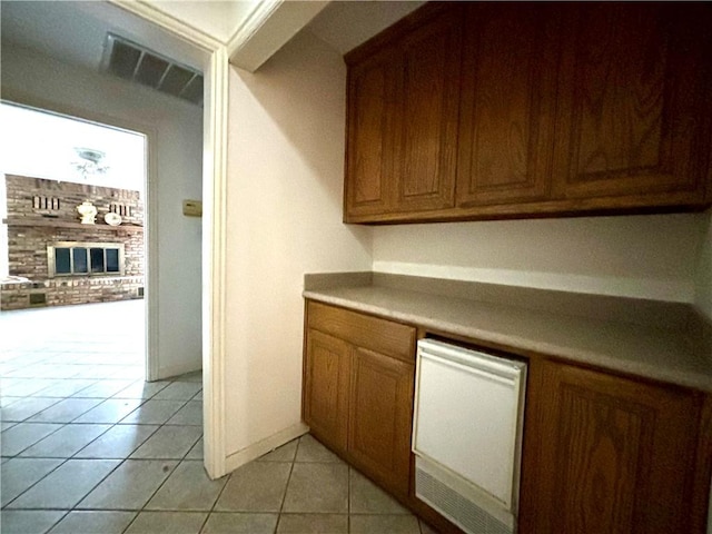 kitchen with light tile patterned floors