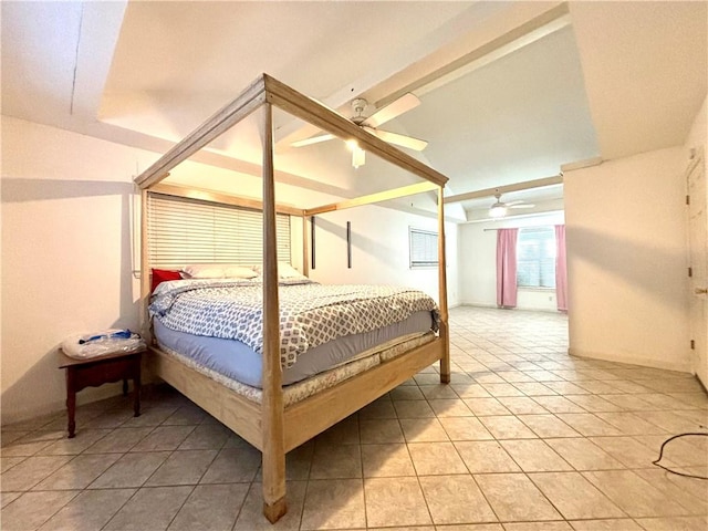 tiled bedroom featuring ceiling fan