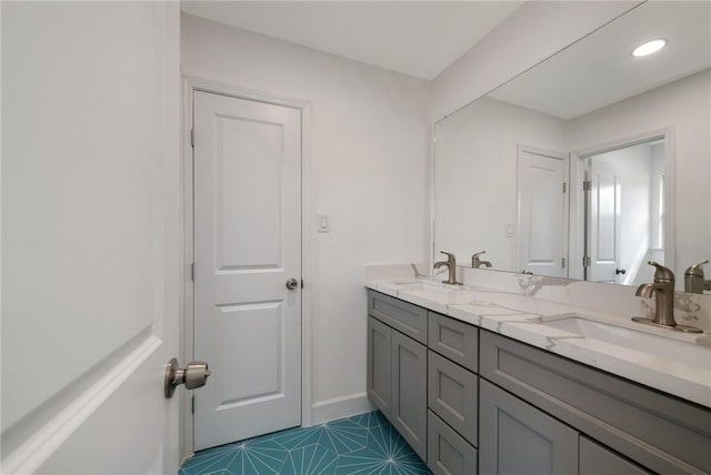 bathroom featuring tile patterned floors and vanity