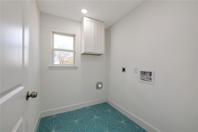 laundry room featuring tile patterned floors, electric dryer hookup, cabinets, and hookup for a washing machine