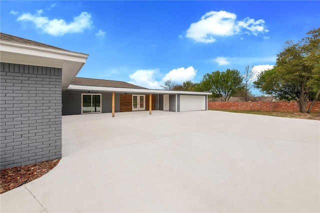 view of patio with a garage