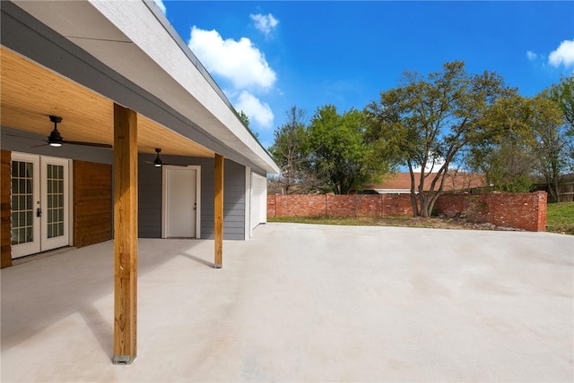 view of patio with french doors and ceiling fan