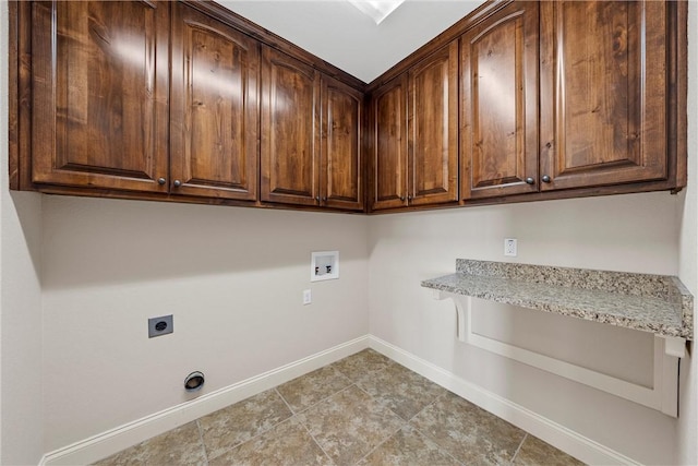 laundry room with hookup for a washing machine, cabinets, and hookup for an electric dryer