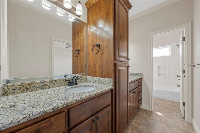 bathroom featuring shower / bath combination, crown molding, tile patterned floors, and vanity