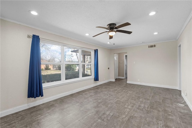 unfurnished room with ceiling fan, recessed lighting, visible vents, baseboards, and crown molding