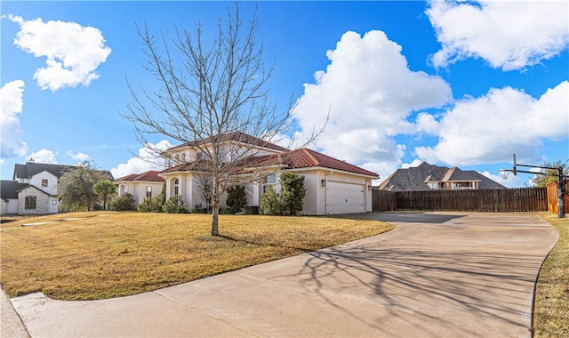 view of front facade featuring a front yard and a garage