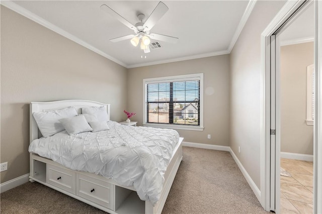 bedroom featuring ceiling fan, light colored carpet, and ornamental molding