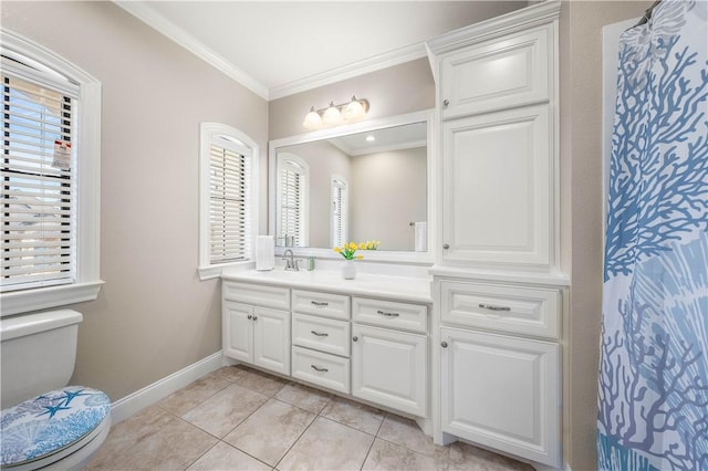 bathroom featuring toilet, vanity, tile patterned flooring, and crown molding